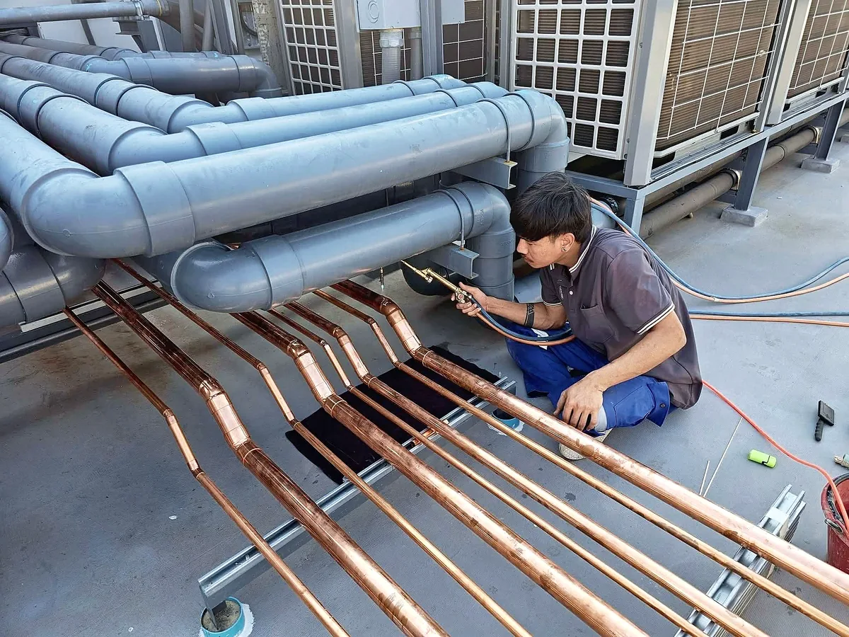 Copper refrigerant pipe installation and brazing preparation